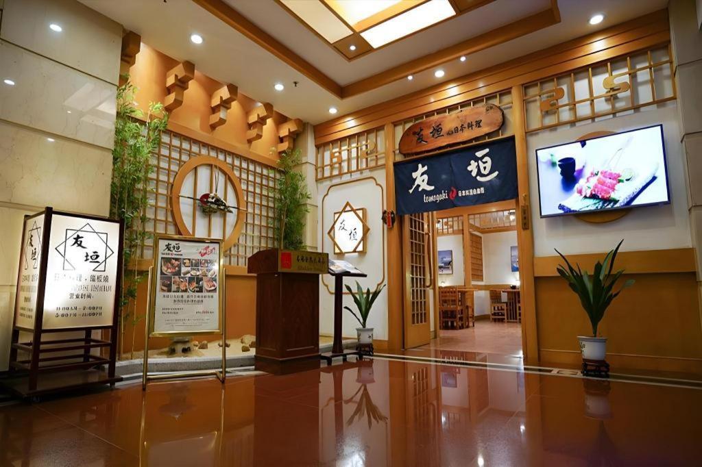 Fenggang Gladden Hotel Tiantangwei Exterior foto